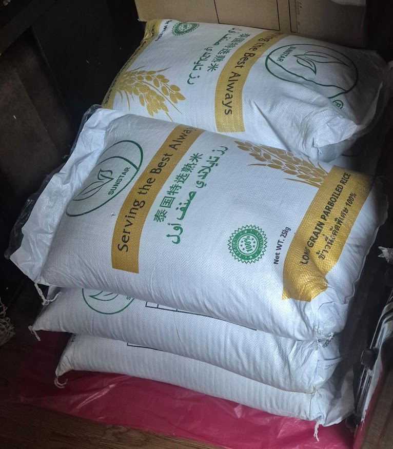 human hearts giving out rice to the needy